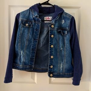Denim jacket with sweatshirt sleeves and hood.